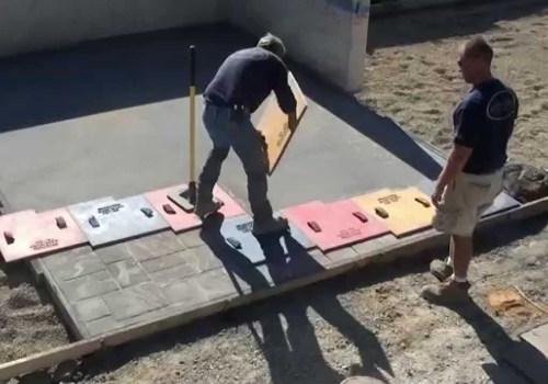 Applying Stamps to Stamped Concrete Installation Process